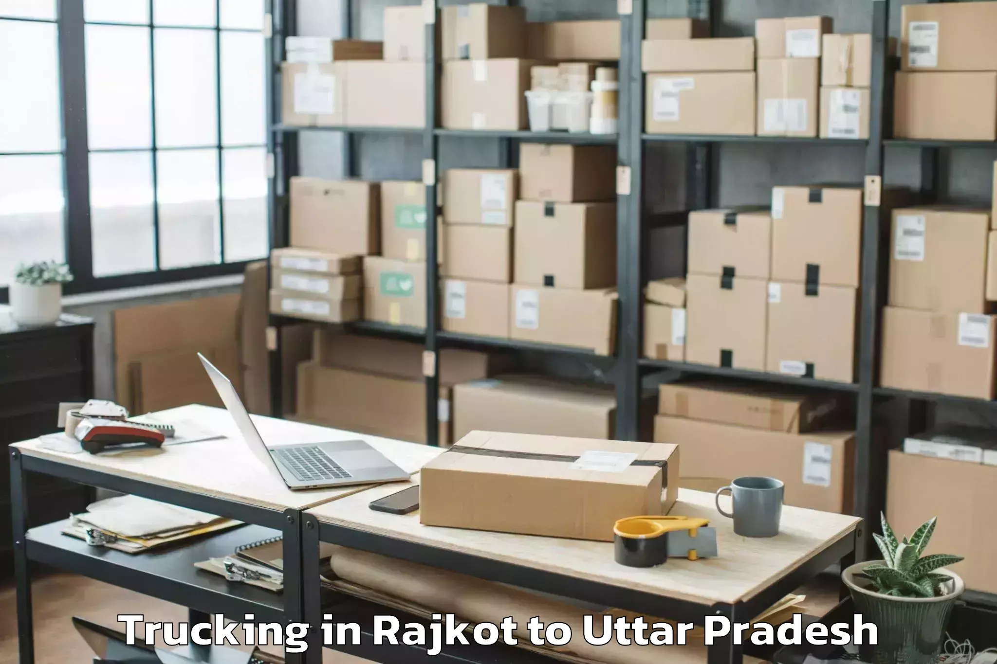 Book Rajkot to Lalganj Ajhara Trucking Online